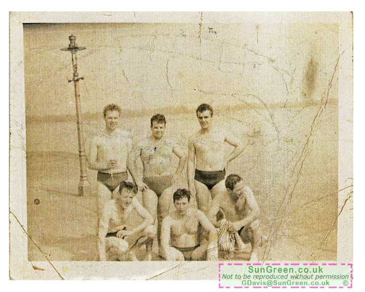 An old photo of young men at the Pier at Lydney Docks