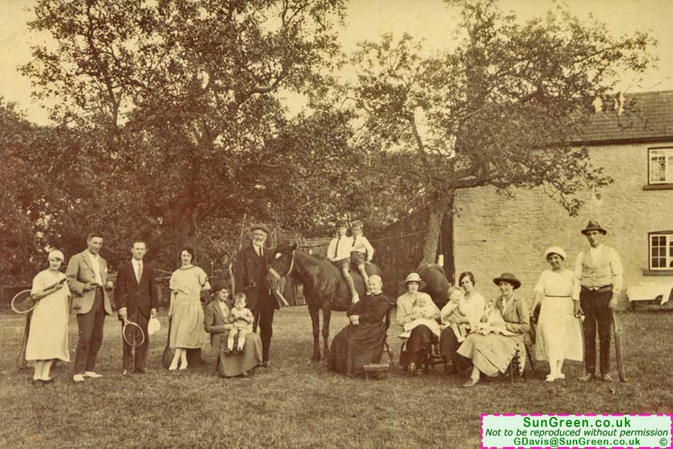 Photo of a family outside Sallowvallets Lodge.