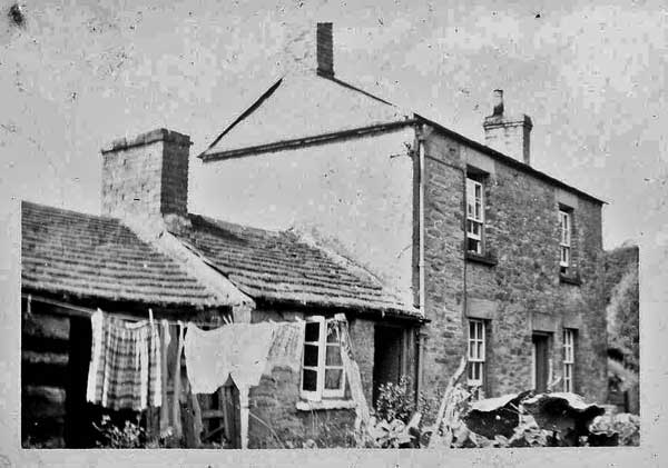 A photo of the Jones house at Fetter hill on washing day.