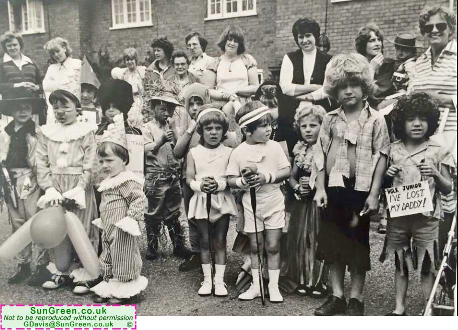 An old photo of a group in Whitecroft Carnival gathered at Park Hill Whitecroft.