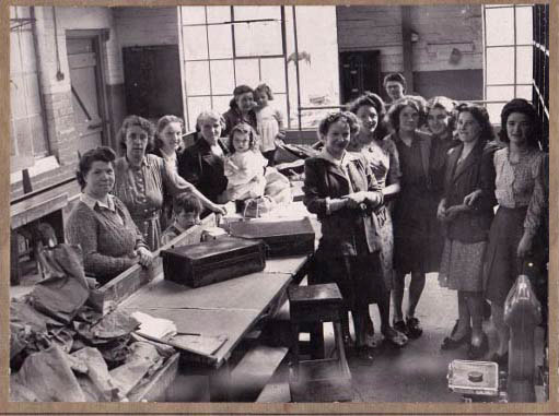 A photo of employees at Whitecroft Pin Factory.