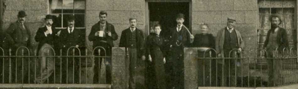 Detail from a photo of men outside the Kings Head