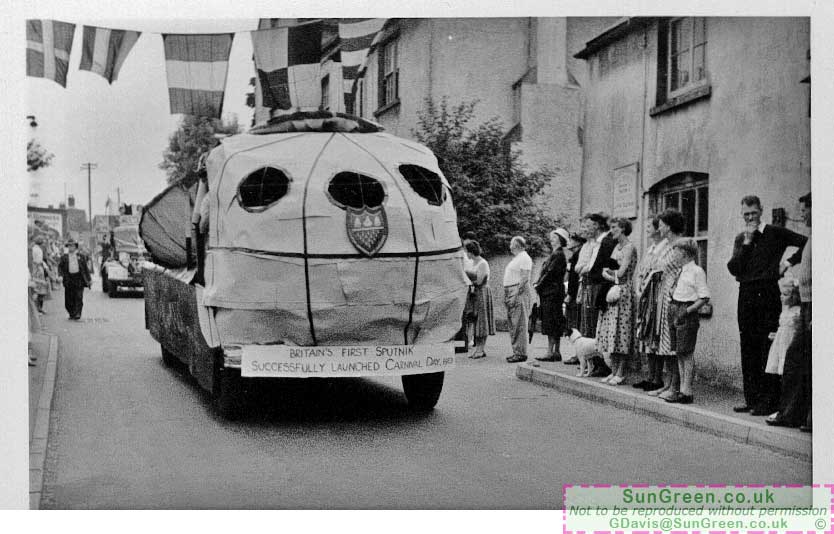 A photo of Coleford Carnival in 1957 showing a sputnik float