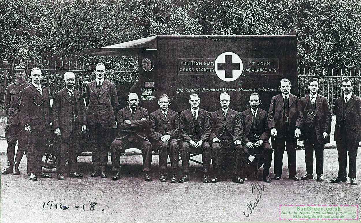 A photo of Lydney men standing in front of a World War 1 ambulance.