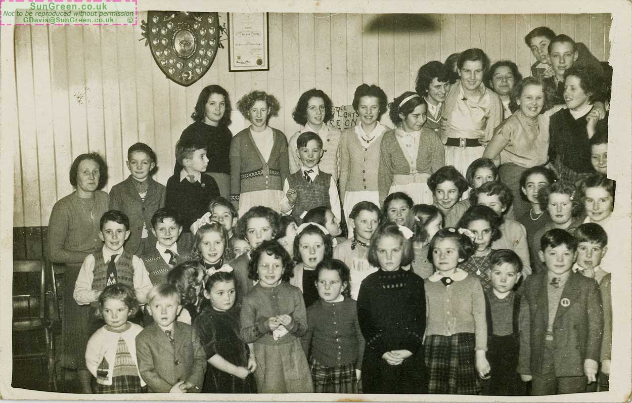 A photo of children at a  party in the Yorkley Institute in 1954